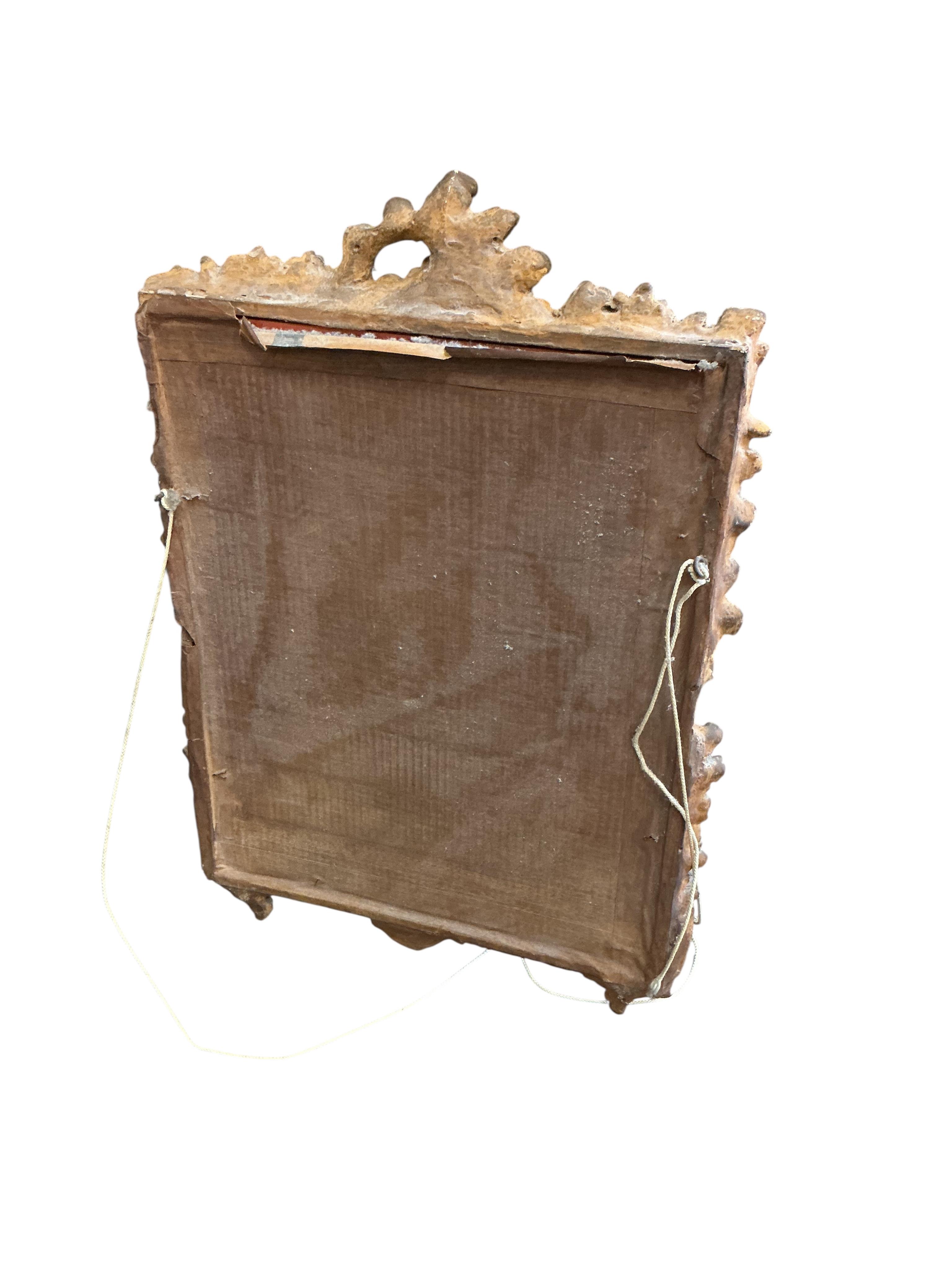A Victorian style gilt composition rectangular wall mirror, width 42cm, height 59cm